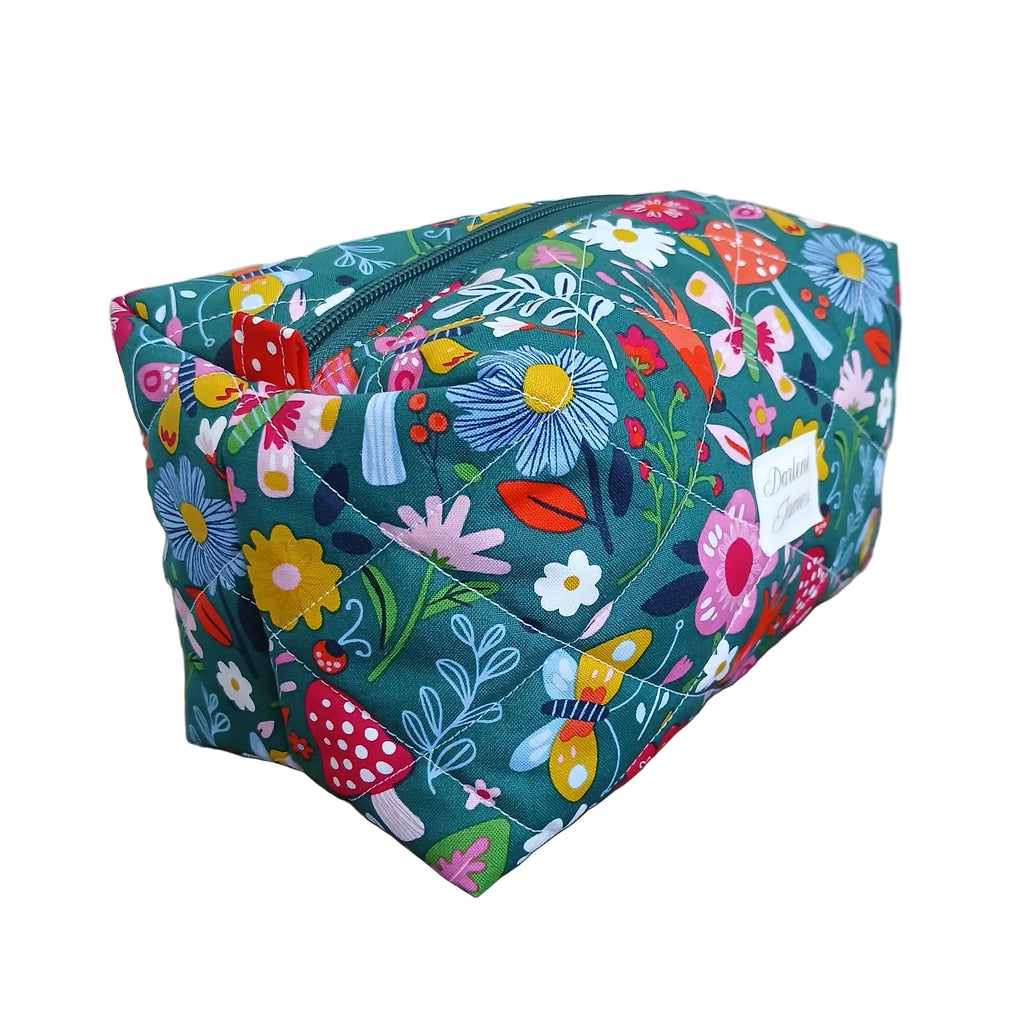 Colorful floral-patterned bag on a wooden surface